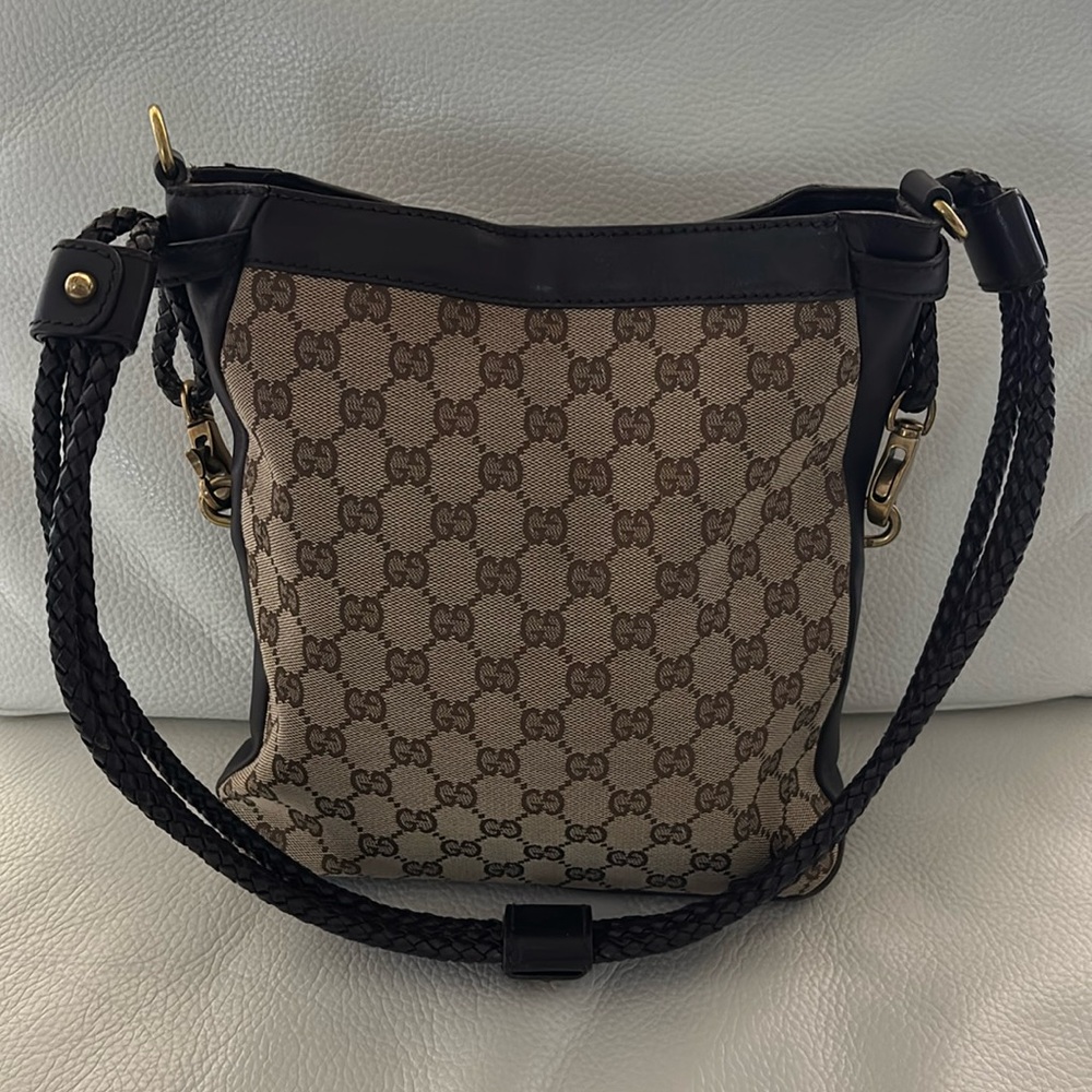 Genuine Gucci canvas leather trim in very good condition